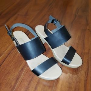 Black and cream clog type heels. Size 7